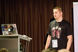 Andrzej Mazur talking about js13kGames compo at onGameStart conference